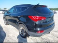 2016 Hyundai Santa Fe — photo 3 of 17 | VIN 5XYZUDLA8GG333297