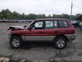 2000 Toyota RAV4 — photo 14 of 16 | VIN JT3HP10V2Y0231224