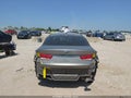 2018 Kia Optima — photo 17 of 21 | VIN 5XXGT4L38JG222451