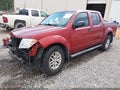 2014 Nissan Frontier — photo 2 of 18 | VIN 1N6AD0ER7EN716613