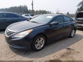 2014 Hyundai Sonata — photo 2 of 14 | VIN 5NPEB4AC9EH907159