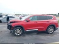 2020 Hyundai Santa Fe — photo 14 of 16 | VIN 5NMS23AD9LH163059