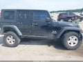 2007 Jeep Wrangler Unlimited — photo 14 of 19 | VIN 1J4GA39117L136584