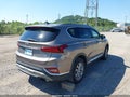 2019 Hyundai Santa Fe — photo 4 of 16 | VIN 5NMS3CAD2KH007926