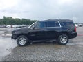 2015 Chevrolet Tahoe — photo 14 of 16 | VIN 1GNSCAKC0FR102035