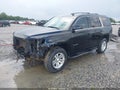 2015 Chevrolet Tahoe — photo 2 of 16 | VIN 1GNSCAKC0FR102035