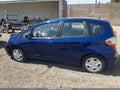 2012 Honda Fit — photo 14 of 16 | VIN JHMGE8H35CC004947