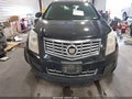 2014 Cadillac SRX — photo 12 of 19 | VIN 3GYFNEE31ES675703