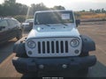 2014 Jeep Wrangler — photo 12 of 16 | VIN 1C4AJWAG1EL159907
