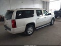 2009 Chevrolet Suburban 1500 — photo 4 of 16 | VIN 1GNFK36Y69R236526