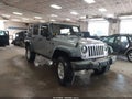 2015 Jeep Wrangler Unlimited — photo 1 of 16 | VIN 1C4BJWDG3FL504842