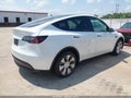 2022 Tesla Model Y — photo 4 of 12 | VIN 7SAYGDEE0NF424560