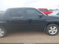 2013 Honda Ridgeline — photo 13 of 16 | VIN 5FPYK1F50DB003355