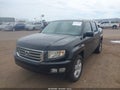 2013 Honda Ridgeline — photo 2 of 16 | VIN 5FPYK1F50DB003355