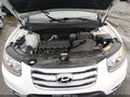2012 Hyundai Santa Fe — photo 10 of 11 | VIN 5XYZG3AB2CG154891