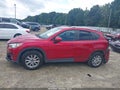 2016 Mazda CX-5 — photo 14 of 20 | VIN JM3KE4CY4G0608009