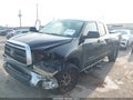 2012 Toyota Tundra — photo 2 of 16 | VIN 5TFRM5F17CX045649