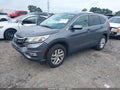 2016 Honda CR-V — photo 2 of 17 | VIN 3CZRM3H58GG712799