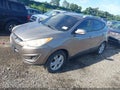 2011 Hyundai Tucson — photo 2 of 12 | VIN KM8JU3AC8BU185845