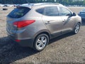 2011 Hyundai Tucson — photo 4 of 12 | VIN KM8JU3AC8BU185845