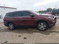 2018 Honda Pilot — photo 13 of 16 | VIN 5FNYF5H5XJB018054
