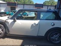 2010 Mini Cooper — photo 14 of 16 | VIN WMWMF7C56ATX41878