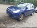 2012 Hyundai Tucson — photo 2 of 12 | VIN KM8JUCAC4CU419741