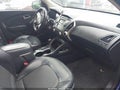 2012 Hyundai Tucson — photo 5 of 12 | VIN KM8JUCAC4CU419741