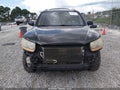2009 Hyundai Santa Fe — photo 6 of 11 | VIN 5NMSH13E99H275202