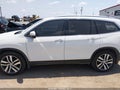 2017 Honda Pilot — photo 14 of 16 | VIN 5FNYF5H95HB018556