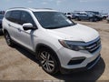 2017 Honda Pilot — photo 1 of 16 | VIN 5FNYF5H95HB018556
