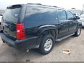 2011 Chevrolet Suburban — photo 4 of 16 | VIN 1GNSKJE38BR327764