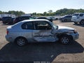 2004 Hyundai Accent — photo 13 of 16 | VIN KMHCG35C74U292656