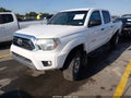 2015 Toyota Tacoma — photo 2 of 15 | VIN 5TFJU4GN2FX064915