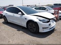 2022 Tesla Model 3 — photo 1 of 14 | VIN 5YJ3E1EA0NF111744