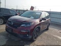 2022 Honda Pilot — photo 2 of 16 | VIN 5FNYF5H2XNB030992