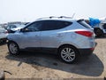 2012 Hyundai Tucson — photo 14 of 16 | VIN KM8JU3AC1CU362351