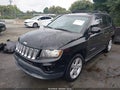2014 Jeep Compass — photo 2 of 17 | VIN 1C4NJCEA6ED678967