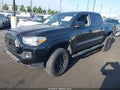 2021 Toyota Tacoma — photo 2 of 18 | VIN 3TYAX5GN6MT013745