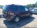 2014 Honda Pilot — photo 4 of 17 | VIN 5FNYF4H92EB048572