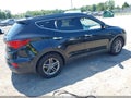 2018 Hyundai Santa Fe — photo 4 of 11 | VIN 5NMZUDLB1JH103848