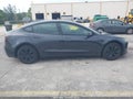 2024 Tesla Model 3 — photo 13 of 19 | VIN 5YJ3E1EA7RF849613