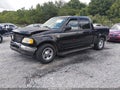 2003 Ford F-150 — photo 2 of 12 | VIN 1FTRW07L33KB99723