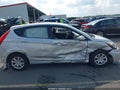 2012 Hyundai Accent — photo 13 of 16 | VIN KMHCT5AEXCU057617