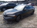 2026 Honda Civic — photo 2 of 16 | VIN 2HGFE1E58TH474186