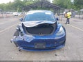 2022 Tesla Model 3 — photo 13 of 17 | VIN 5YJ3E1EA2NF185229