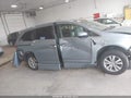 2014 Honda Odyssey — photo 13 of 16 | VIN 5FNRL5H69EB036007