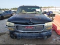 2003 GMC Yukon XL — photo 13 of 17 | VIN 1GKFK66U83J283820