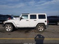 2013 Jeep Wrangler Unlimited — photo 14 of 16 | VIN 1C4BJWEG2DL550139
