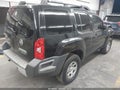 2014 Nissan Xterra — photo 4 of 16 | VIN 5N1AN0NWXEN803360
